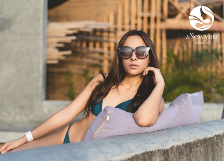 Green Bathing Suit Couch Medical Aesthetic Spa Lapeer Oxfordlue Background